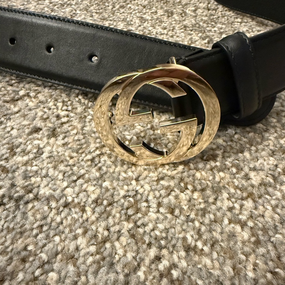 Gucci Black Leather Strap with Gold Accents